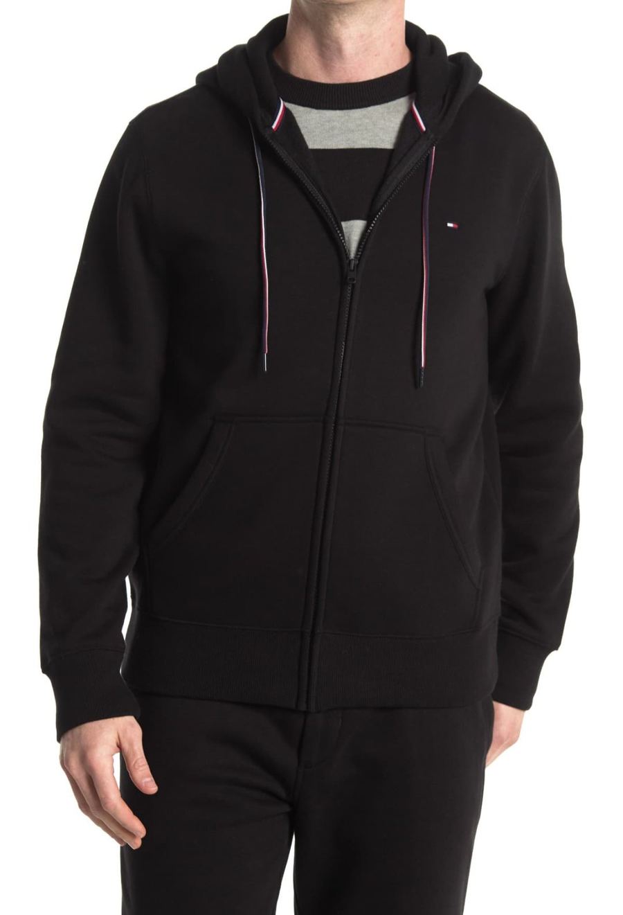 Joe Cummings modeling a black zip hoodie, e-commerce fit photo