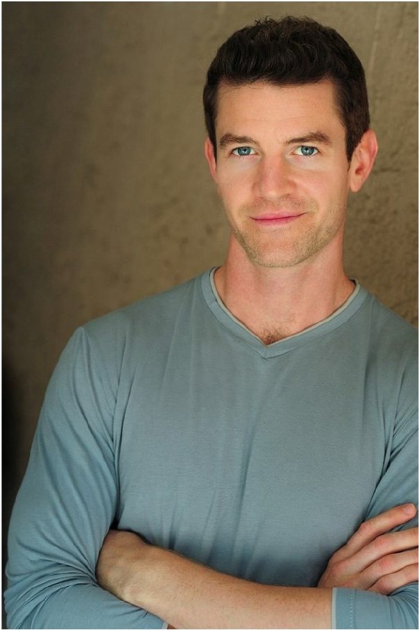 Los Angeles male fit model Joe Cummings in a slate blue fitted shirt